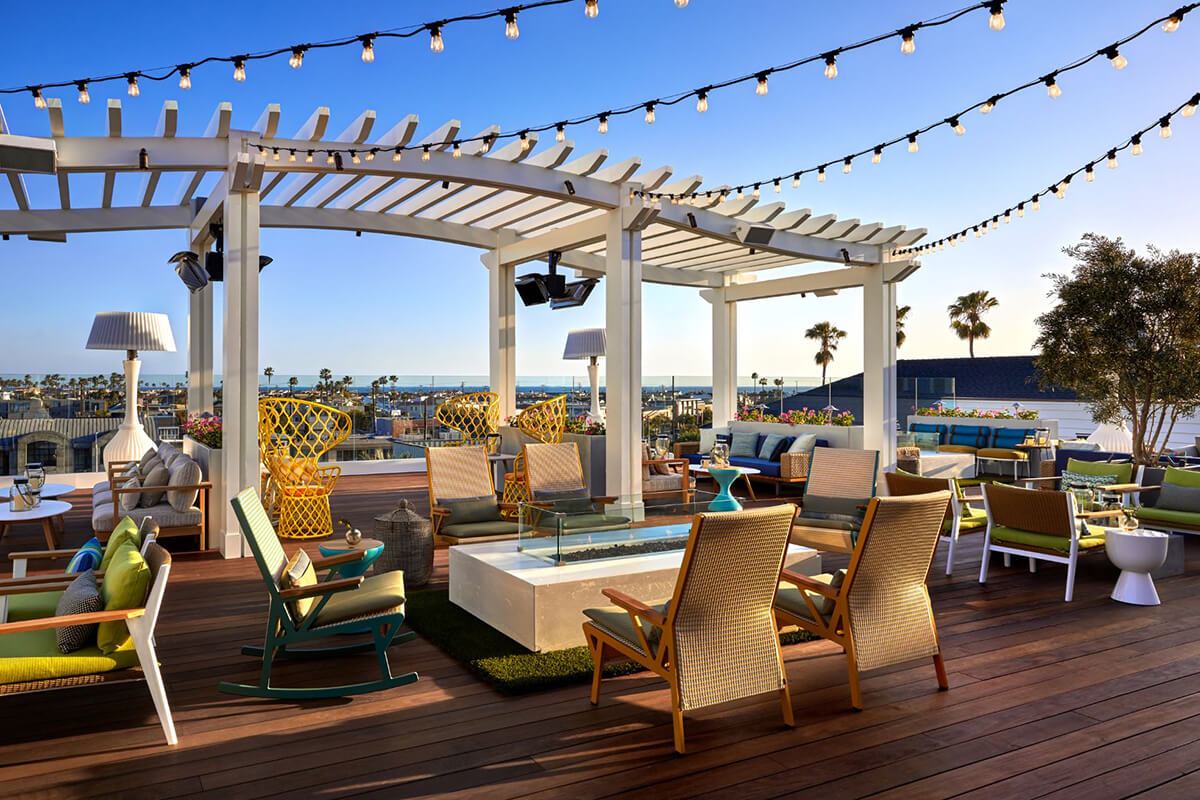 chairs around a firepit, tables