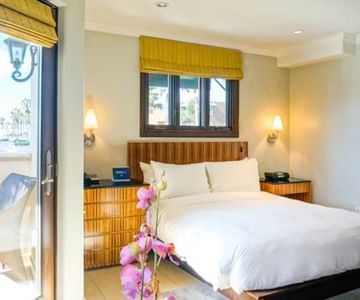 a bed in a hotel room