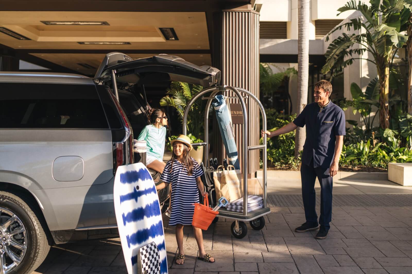 people unloading a car