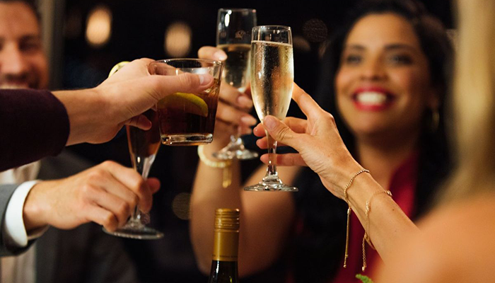 People cheersing on the New Year's Eve Dinner Cruise