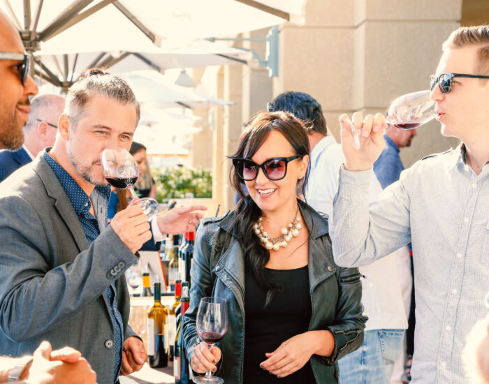 people drinking wine