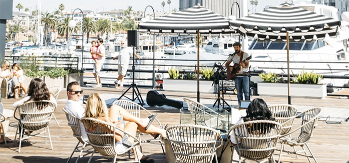 Visitors watching live music performance on Lido deck