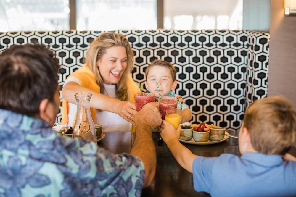 family of 3 eating lunch
