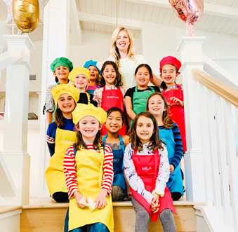 kids wearing aprons and chef hat