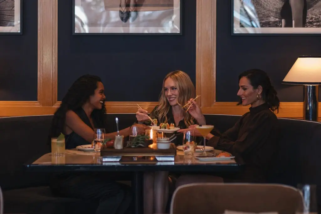 people siting around a table