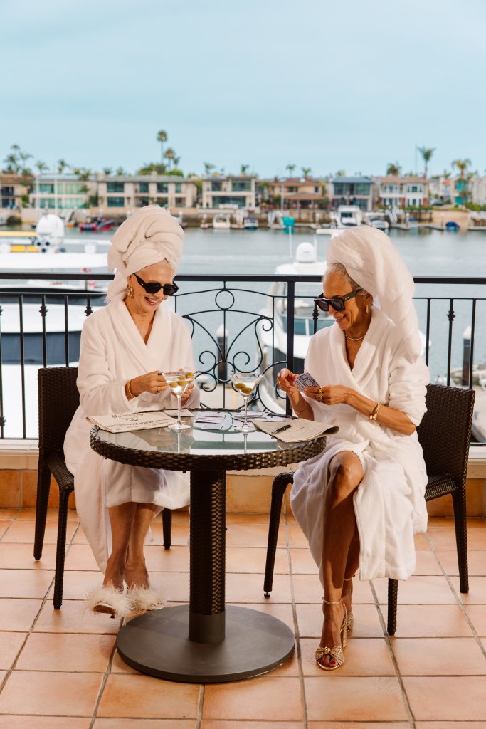 2 women in bathrobs