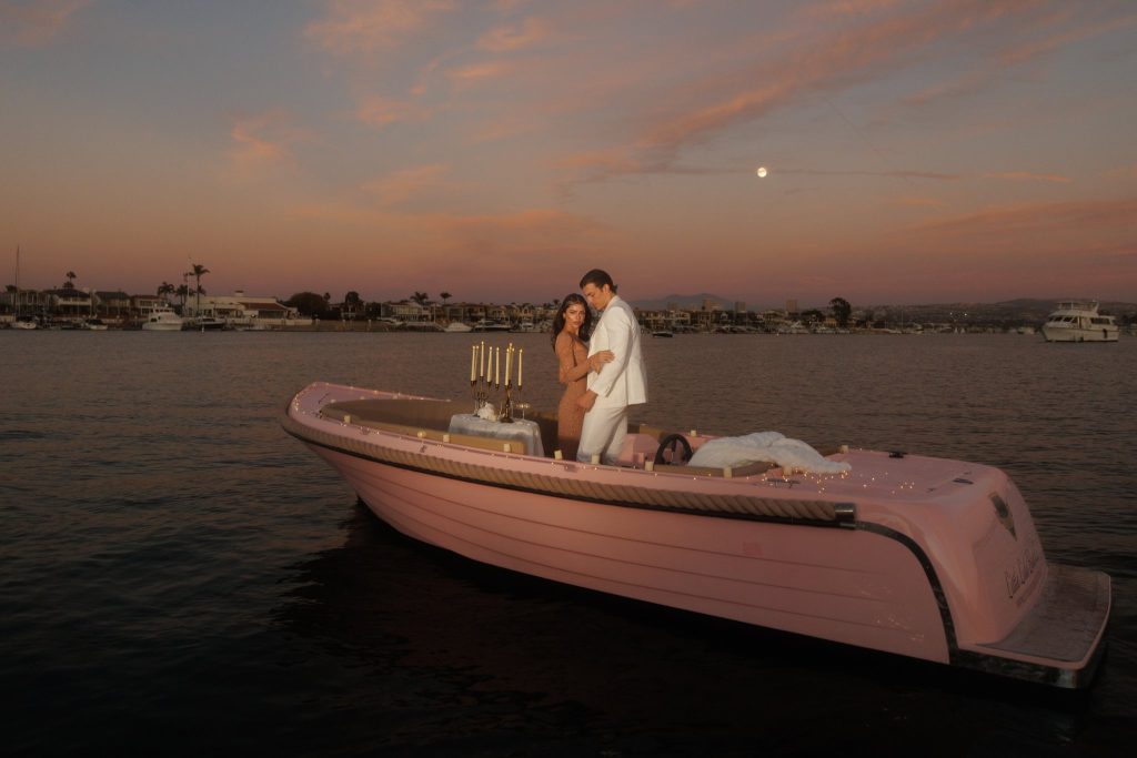 couple on a duffy boat