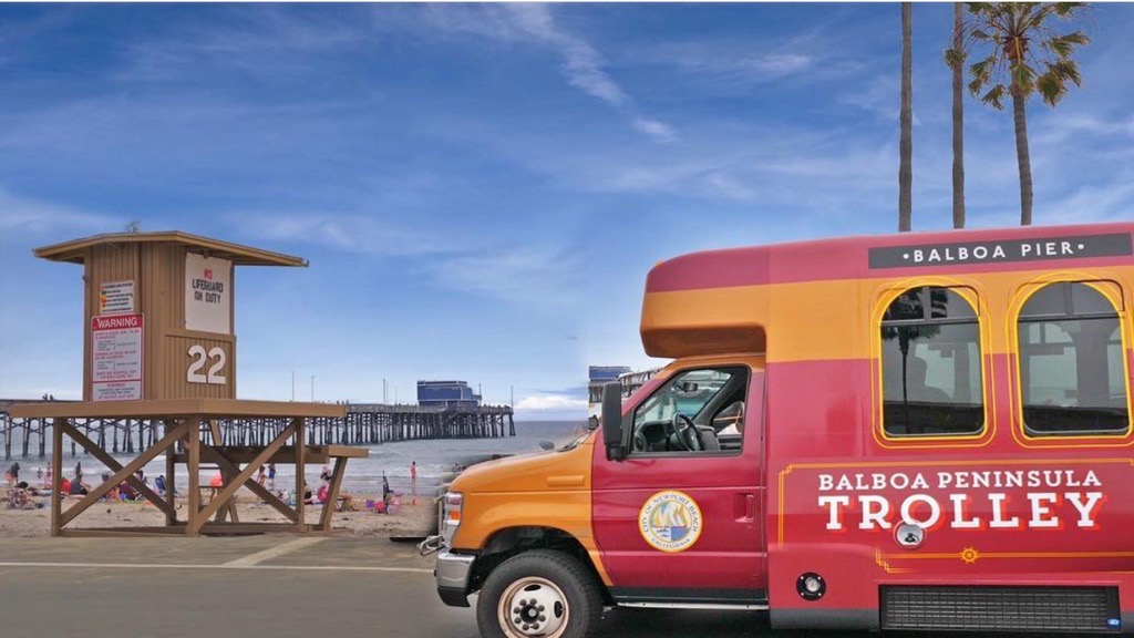 trolly bus in front of beach
