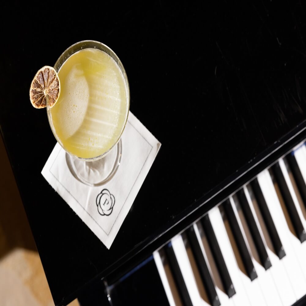 alcoholic beverage on a piano