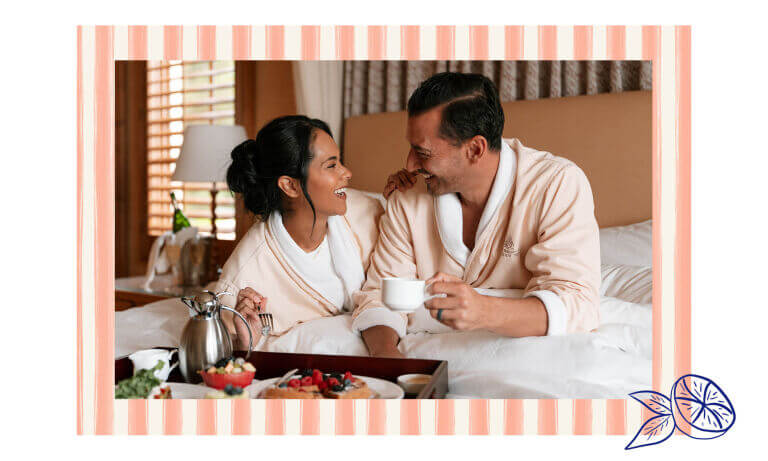 couple having breakfast in bed