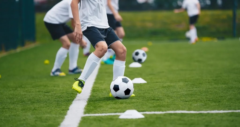 a kid playing soccer