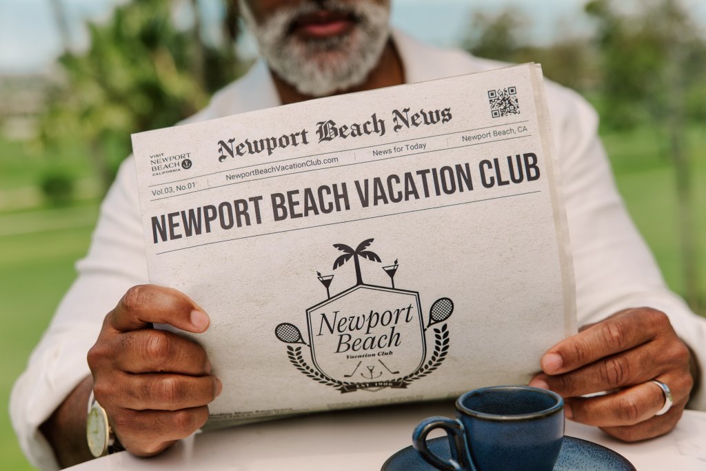 man holding newspaper