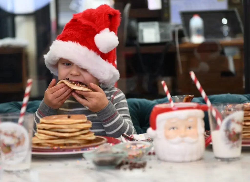 kid eating pancakes