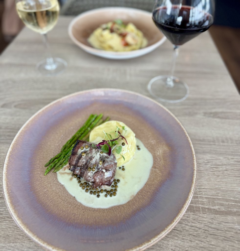 2 plated dishes on a table