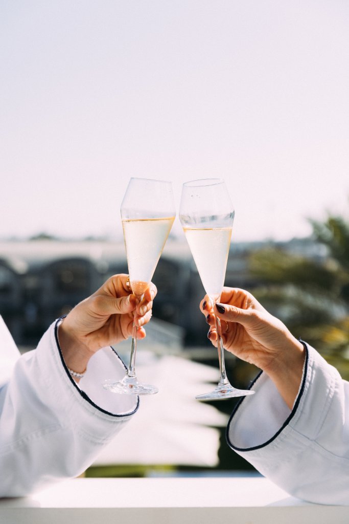 2 people cheersing