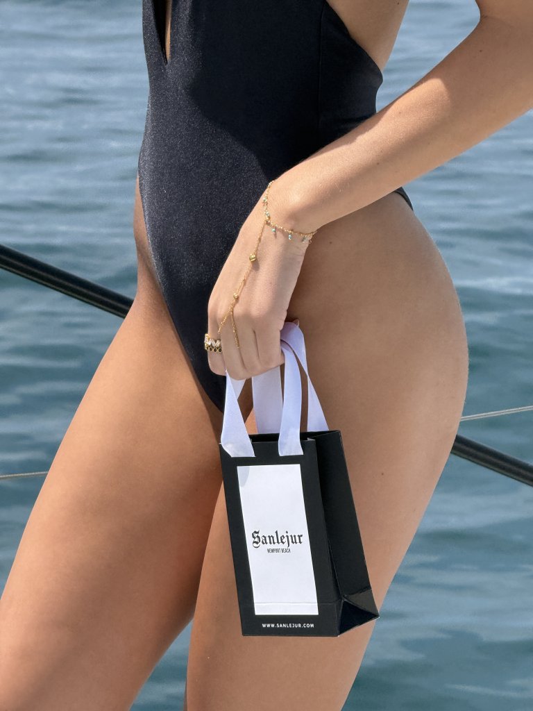 woman holding shopping bag