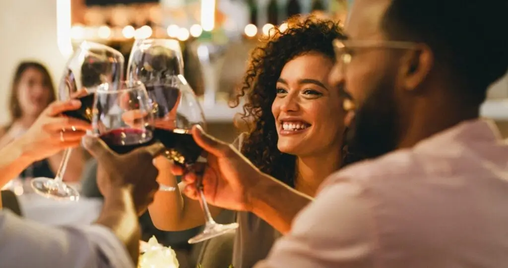 woman holding wine