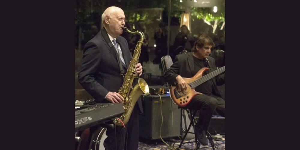Man playing saxophone on stage